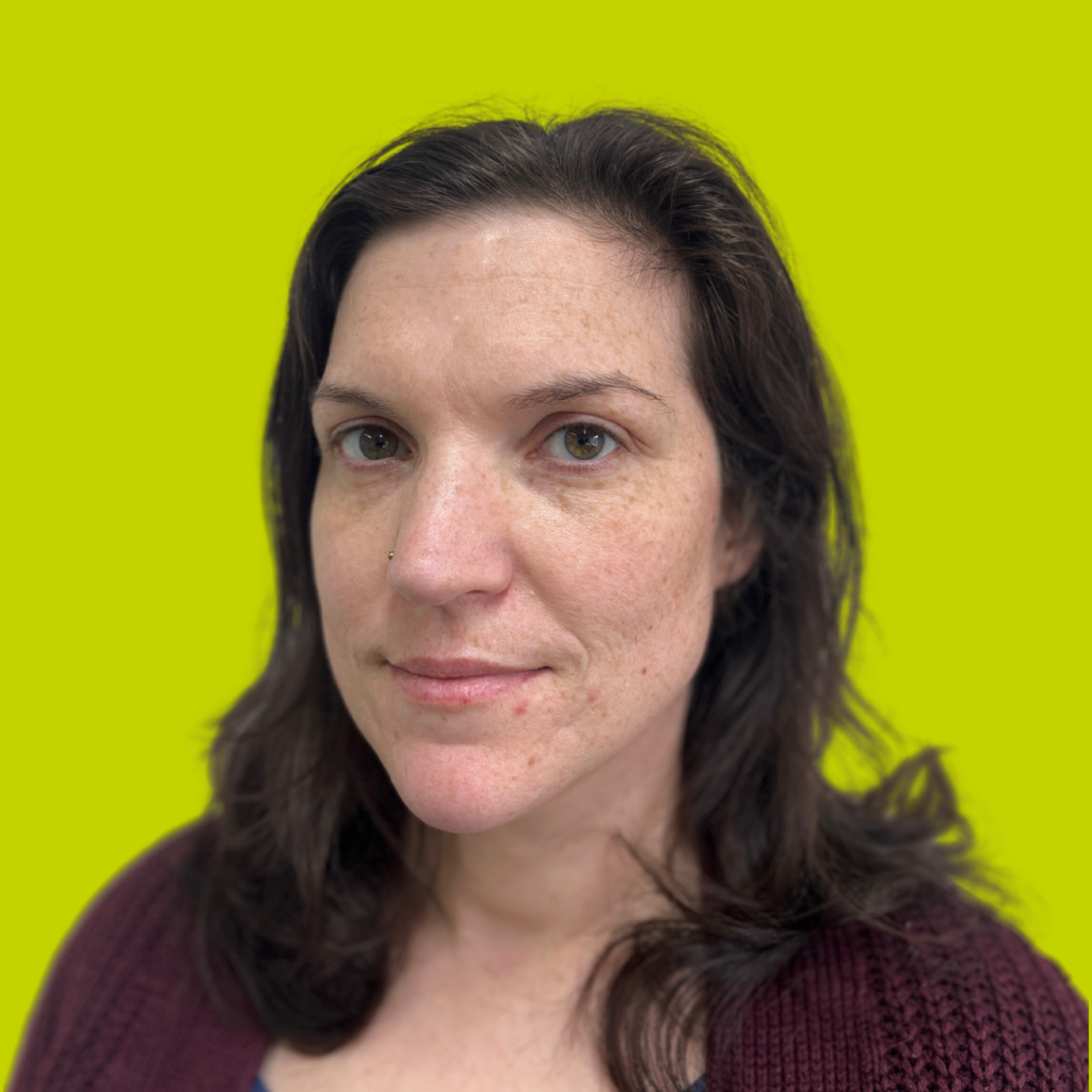 Emily Rodgers Profile Photo w green bg